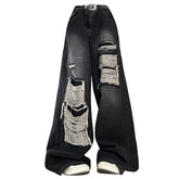 Vaqueros anchos rotos con estética grunge